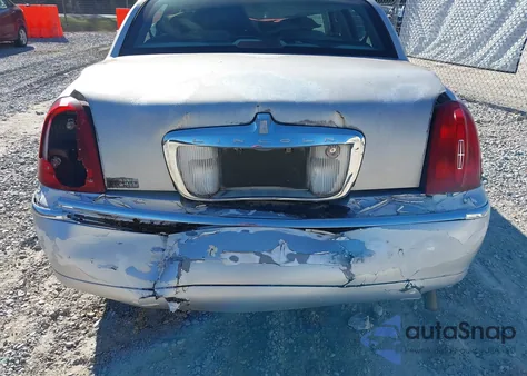 2000 Lincoln Town Car Signature из США, поврежденный, VIN 1LNHM82W5YY915443